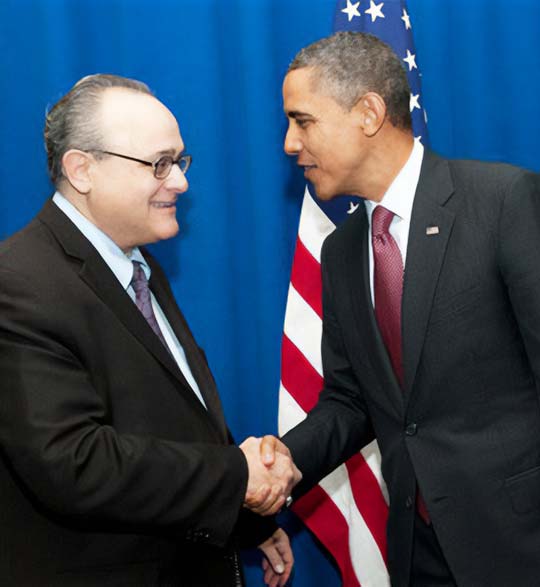 Photo of Jeffery M. Leving shaking hands with Barack Obama